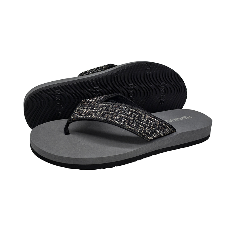 Women's black glitter strap flip flops with lightweight EVA soles for wholesale.
