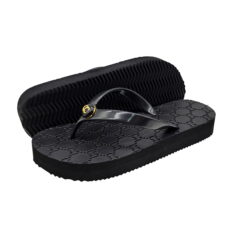 Women's black platform flip flops with textured PU straps and EVA soles.