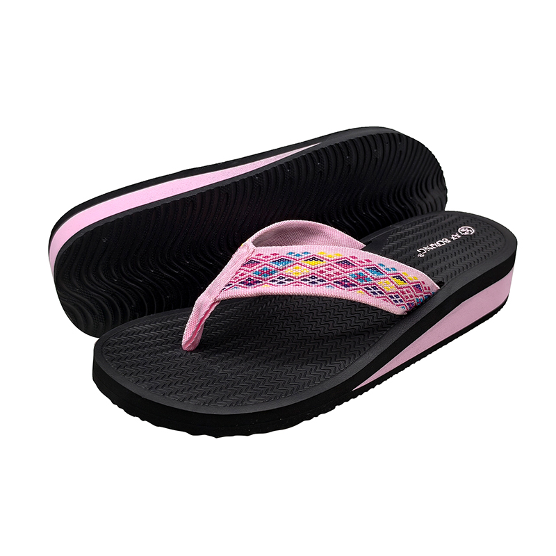 Women's black EVA wedge flip flops with patterned pink fabric straps
