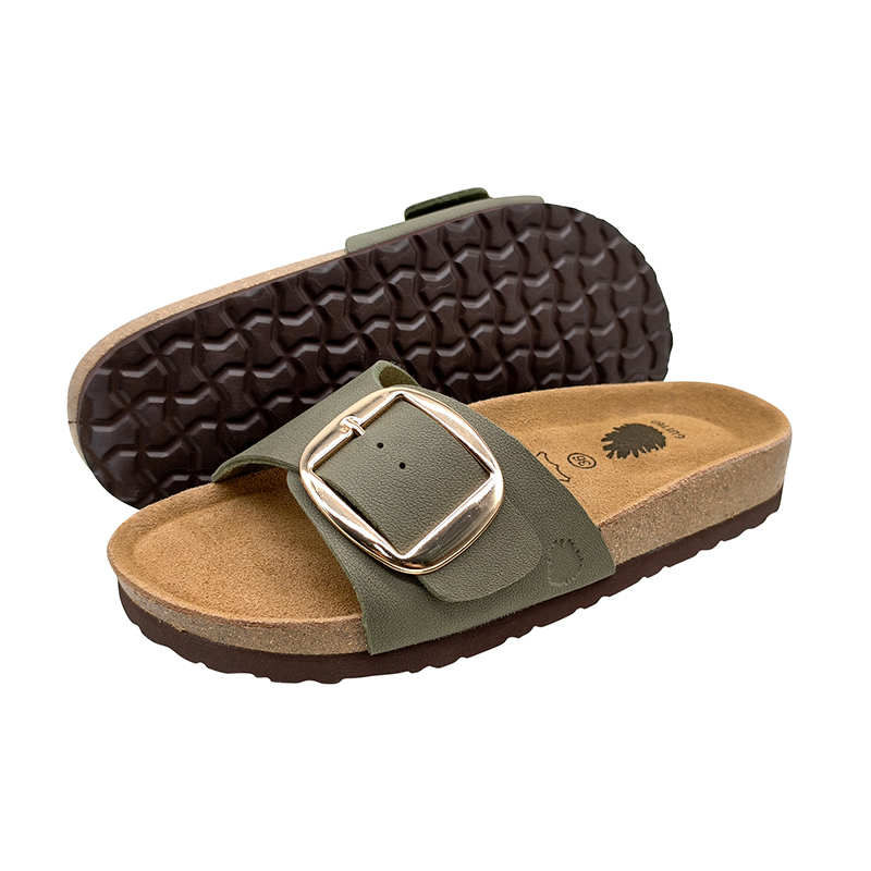 Women's cork slide sandals with olive green PU straps, metal buckles, and textured outsole